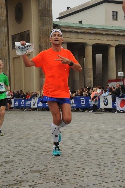 Awkward pose for getting Berlin Marathon finisher pix
